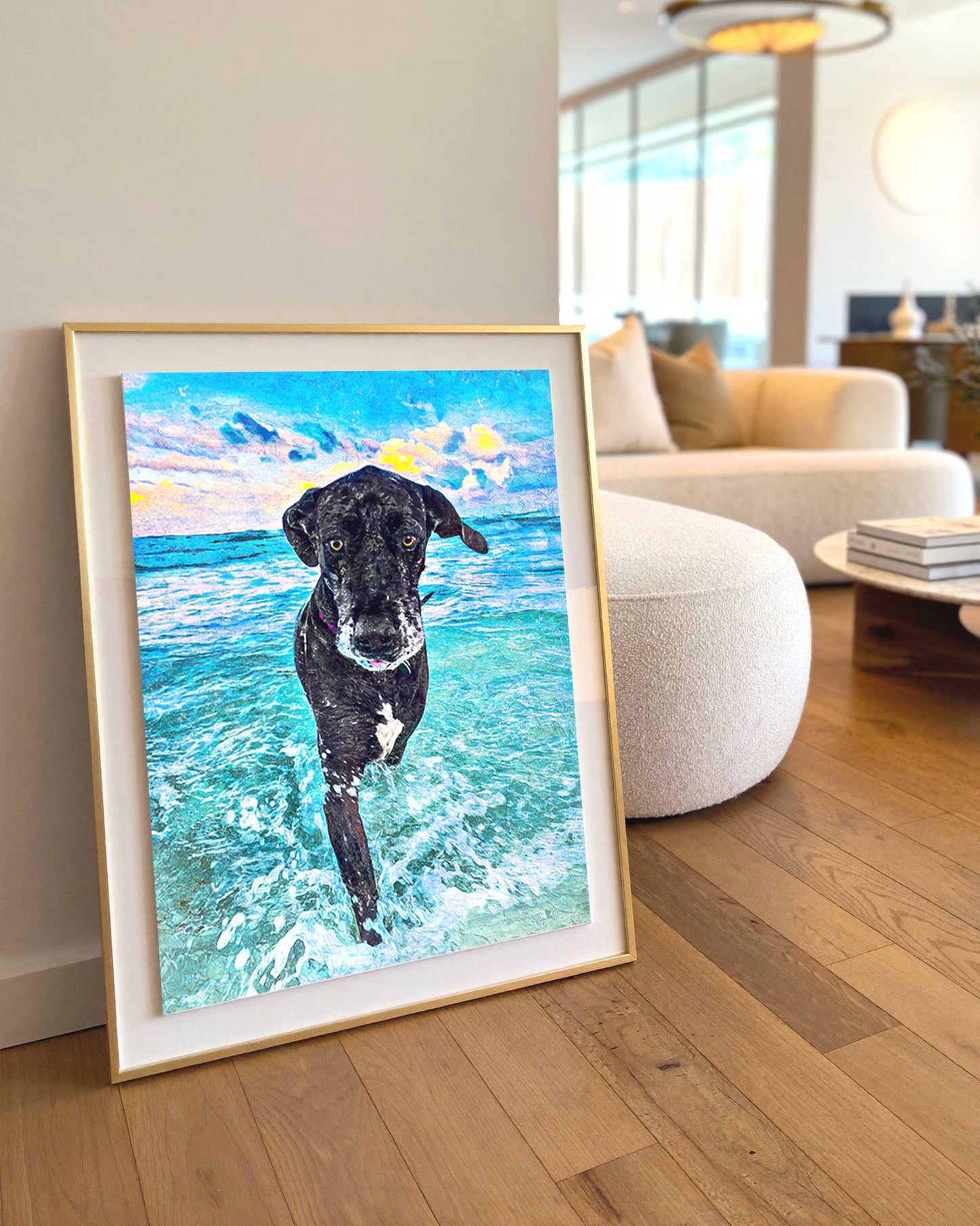 Custom pet portrait of a black dog running through ocean waves, painted art style in gold frame, living room wall art.