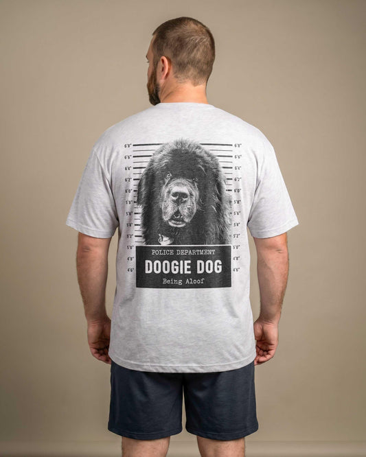 Man wearing heather grey custom dog mugshot t-shirt with a large black Newfoundland dog printed on the back in a police lineup graphic, text reads Police Department Doogie Dog Being Aloof
